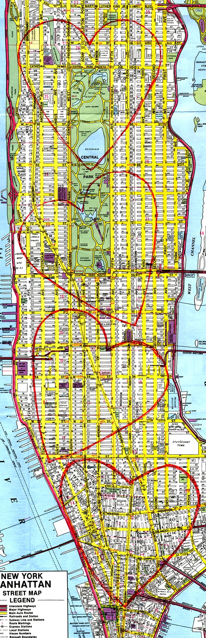 The master map: the four hearts hand-drawn in red marker over a street map of Manhattan, Battery Park to Harlem.